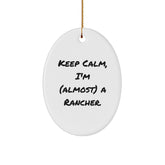 Funny Rancher Oval Ornament Gifts from Friends for Christmas, 'Keep Calm, I'm (almost) A Rancher.' - Image 1